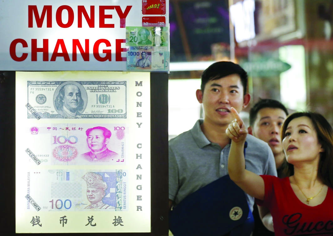 China's foreign exchange regulator said that the slight increase in reserves in June was driven by stronger non-dollar currencies against the greenback. (Reuters)