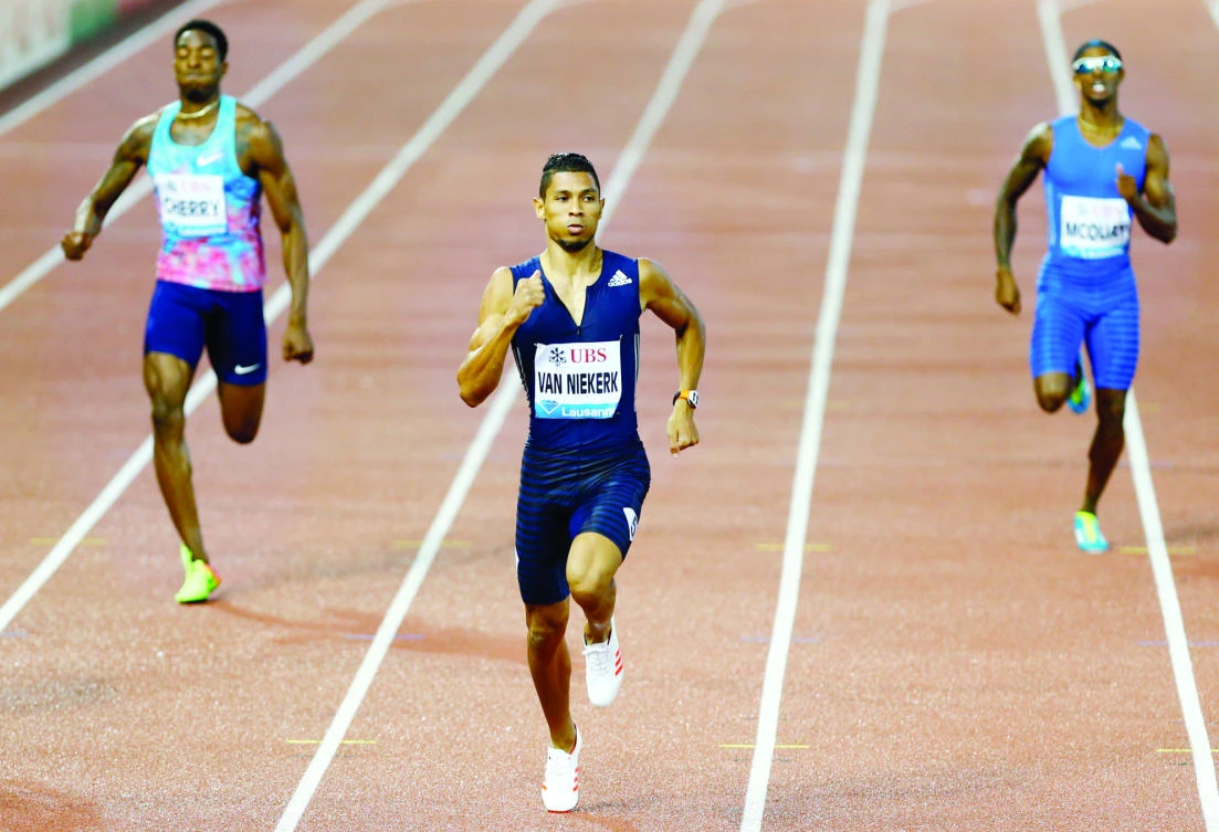 Wayde van Niekerk, center, Tony McQuay, right, and Michael Cherry in action during men's 400 meters of the IAAF Athletics Diamond League meeting at the Stade Olympique de la Pontaise in Lausanne on Thursday night. (Reuters)