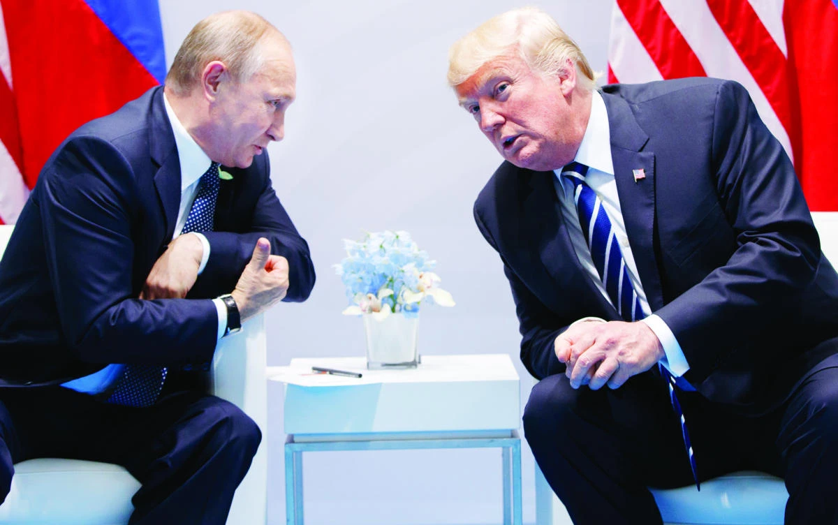 US President Donald Trump speaks during a meeting Friday with Russian President Vladimir Putin at the G-20 Summit in Hamburg, Germany. (AP)
