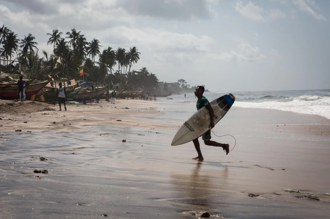 Emmanuel Ansah (Bebe) finishes his semi final set during the international surf day competition on Kokrobite Beach, Ghana on June 18, 2017. The beach, some 30 kilometres (20 miles) west of central Accra, was dotted with dug-out fishing boats, Rastafarians selling t-shirts and small children playing in the sand. According to the World Bank, 897,000 international tourists visited Ghana in 2015. In comparison, just over 1.1 million went to Kenya and 8.9 million travelled to South Africa. (AFP)