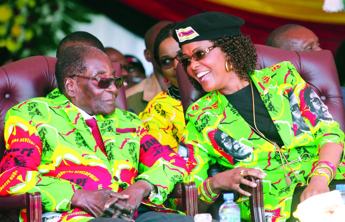 Zimbabwe President Robert Mugabe and his wife Grace attend a youth rally in Marondera, about 100 km east of Harare, in this June 2 file photo. (AP)