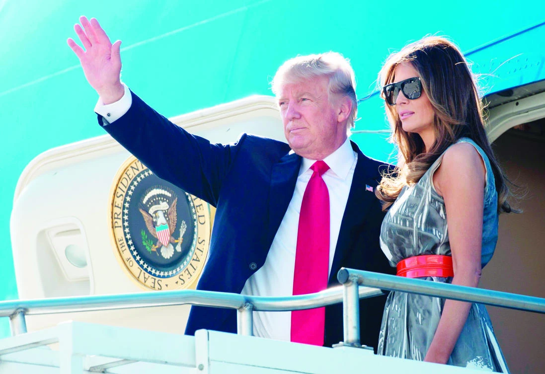 US President Donald Trump and First Lady Melania Trump board Air Force One prior to departure from Hamburg Airport in Hamburg, Germany, on Saturday. (AFP)