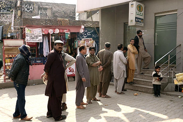 Only 13 percent of Pakistan’s mostly-Muslim adult population holds a bank account. (AFP)