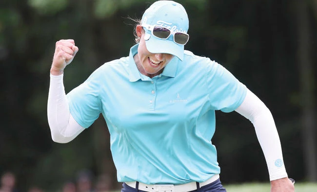Katherine Kirk, of Australia, reacts after sinking the winning putt on the 18th hole during the Thornberry Creek LPGA Classic golf tournament in Hobart, Wis., Sunday. (AP)