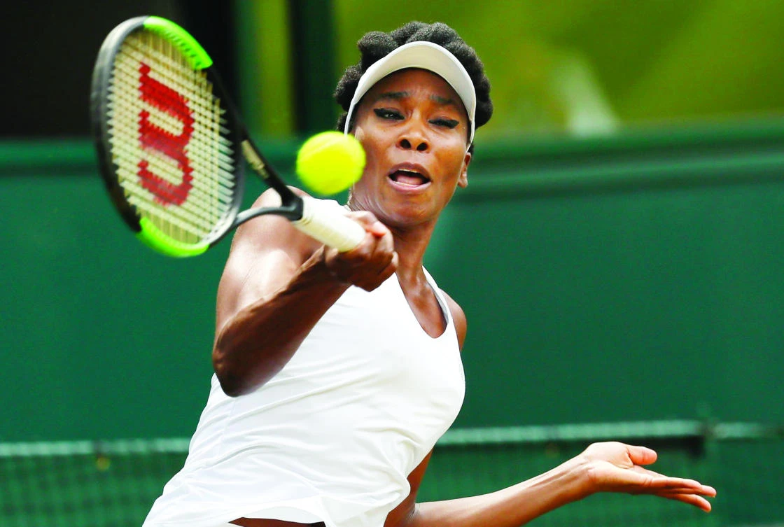 Venus Williams of the US returns to Croatia’s Ana Konjuh during their women’s singles match on day seven at the Wimbledon Tennis Championships in London Monday. (AP)