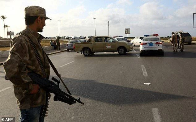 Forces loyal to Libya's Government of National Accord man a checkpoint in the Hay al-Andalus neighbourhood of Tripoli in March 2017. (AFP)