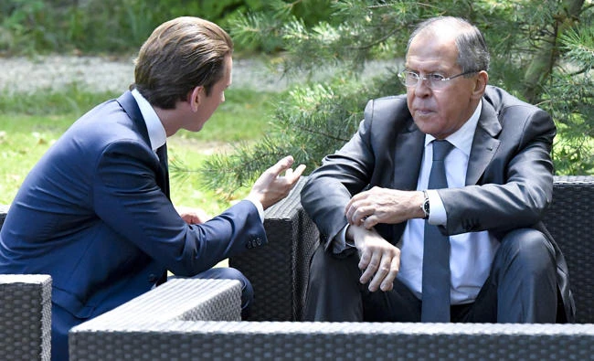 Austrian Foreign Minister Sebastian Kurz, left, holds talks with Russian Minister of Foreign Affairs Sergei Lavrov in Mauerbach, Austria, on Tuesday. (AFP)