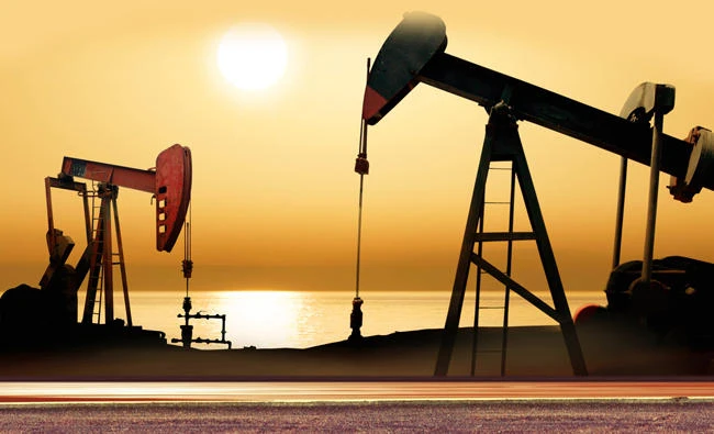 Oil falls as banks cut price forecasts