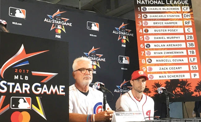 All-Star Game National League manager Joe Maddon, of the Chicago Cubs, left, and National League starting pitcher Max Scherzer are shown during a press conference for the All-Star Game in Miami Monday. (AP)