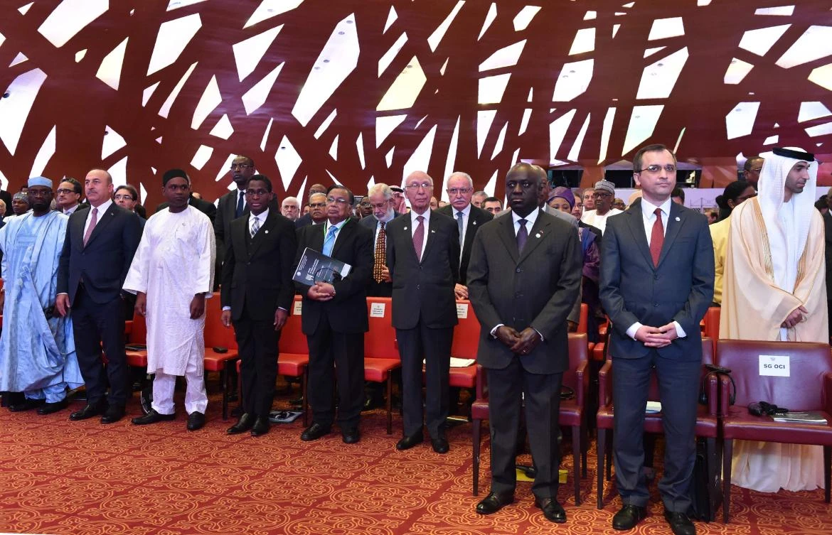 Turkey's Foreign Minister, Mevlut Cavusoglu (2ndL), Burkina Faso's Foreign Minister, Alpha Barry (3rdL), other Foreign Ministers and delegates attend the opening of the 44th meeting of the Ministers of Foreign Affairs of the Organisation of Islamic Cooperation (OIC) on July 10, 2017 in Abidjan. (AFP / ISSOUF SANOGO)