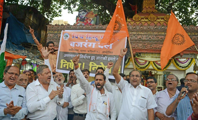 Indian activists from the right-wing Bajrang Dal organization shout anti-Pakistan slogans during a protest to condemn an attack on pilgrims during the annual Amarnath Yatra in Mumbai on tuesday. (AFP / PUNIT PARANJPE0