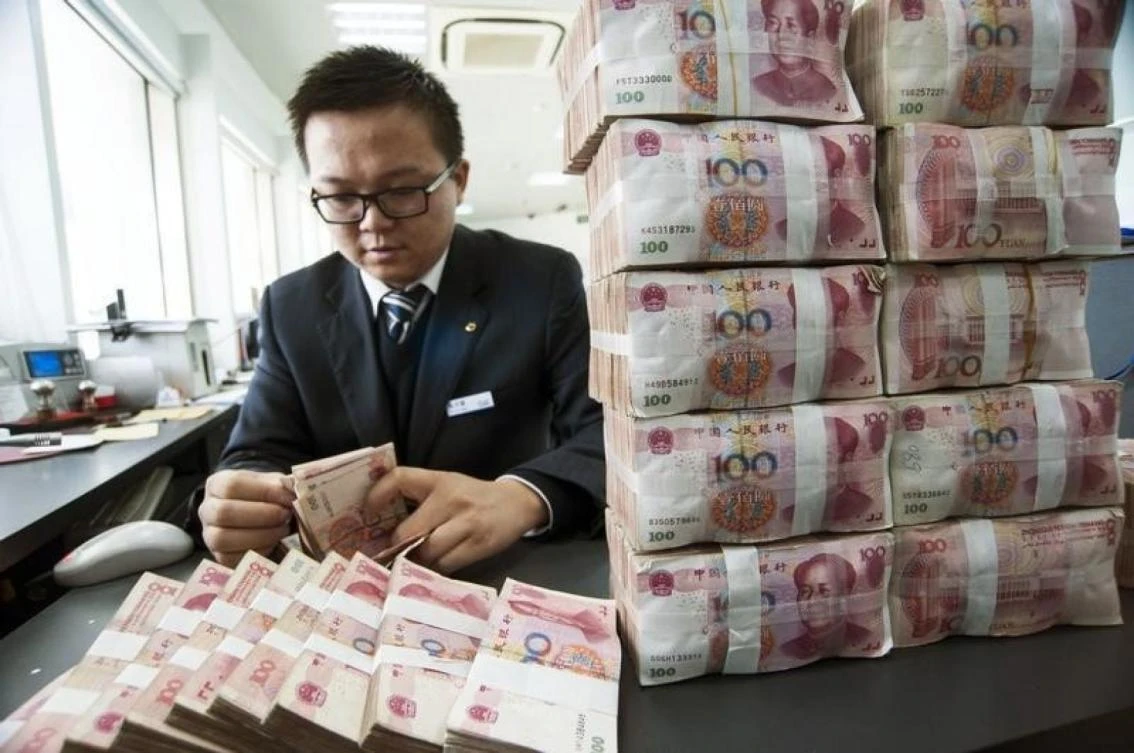 The yuan is restricted to trading up or down 2 percent from a daily reference rate, but policymakers have previously signaled their intention to broaden the band. (Reuters)