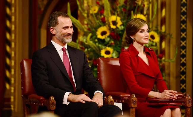 Spain's King Felipe and Queen Letizia take a seat at the Palace of Westminster in London, Britain on Wednesday. (REUTERS/Hannah McKay)