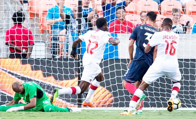 Canada’s midfielder Alphonso Davies, second left, celebrates after scoring a goal during a Group A match against Costa Rica in the 2017 CONCACAF Gold Cup on Tuesday at the BBVA Compass Stadium in Houston, Texas. (AFP)