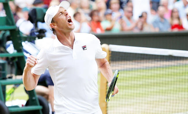 Sam Querrey of the US celebrates after winning the quarterfinal match against Great Britain’s Andy Murray on Wednesday. (Reuters)