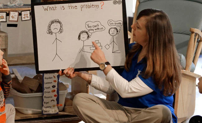 A teacher at the Verner Center in Asheville, N.C.trains children how to handle confrontations in this file photo. (AP)