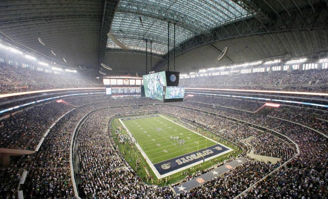 In this Sept. 8, 2013, file photo, fans watch at the start of an NFL football game between the New York Giants and Dallas Cowboys, in Arlington, Texas. The Cowboys are worth $4.2 billion, making them the most valuable sports franchise for the second straight year, according to Forbes. (AP)