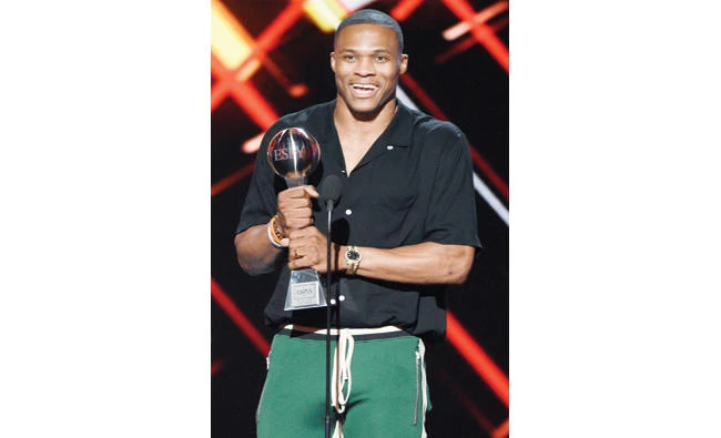 NBA basketball player Russell Westbrook, of the Oklahoma City Thunder, accepts the award for best male athlete at the ESPYS at the Microsoft Theater on Wednesday in Los Angeles. (AP)