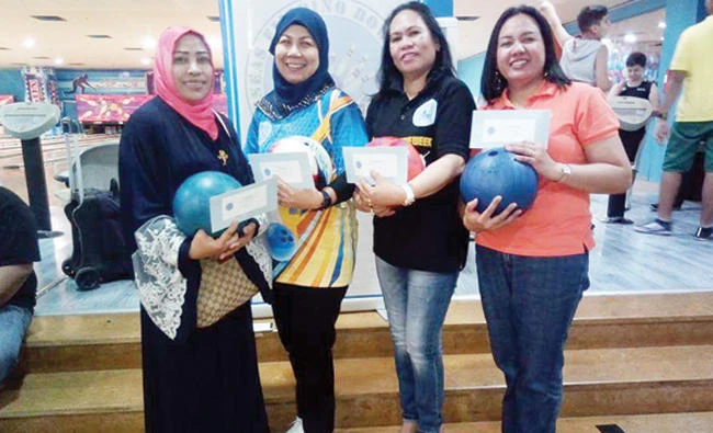 Ladies' division winners, from left, Johara Palot, Shiela Monserate, Carmen Duma and Malou Nidoy. (AN photos)