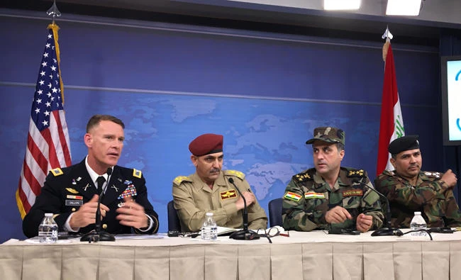US military spokesman Colonel Ryan Dillon (L) speaks as Iraqi security forces spokesmen (L-R) Brigadier General Yahya Rasool, Brigadier General Halgwrd Hikman Ali and Brigadier General Saad Maan look on during a press conference at the Pentagon in Washington, DC, on July 13, 2017. Baghdad is investigating allegations of torture and rights abuses meted out by Iraqi security forces to Daesh prisoners in Mosul, two Iraqi officials said at the Pentagon. (AFP / Thomas Watkins)