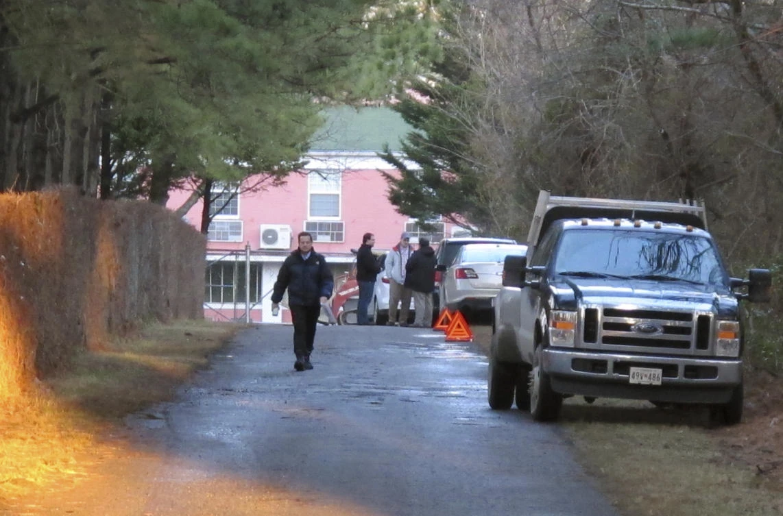 File photo, an entrance to the grounds of a riverfront compound near Centerville, Maryland, that has been used by Russian Federation diplomats for years is blocked to reporters by state department personnel. Resolving a dispute over Russian diplomatic compounds the US seized last year could help repair relations between Washington and Moscow. After Russia meddled in the presidential election, the Obama administration expelled 35 Russian officials from the US and shut down two Cold War-era recreational estates, which President Barack Obama said were being used for spy operations.(AP)
