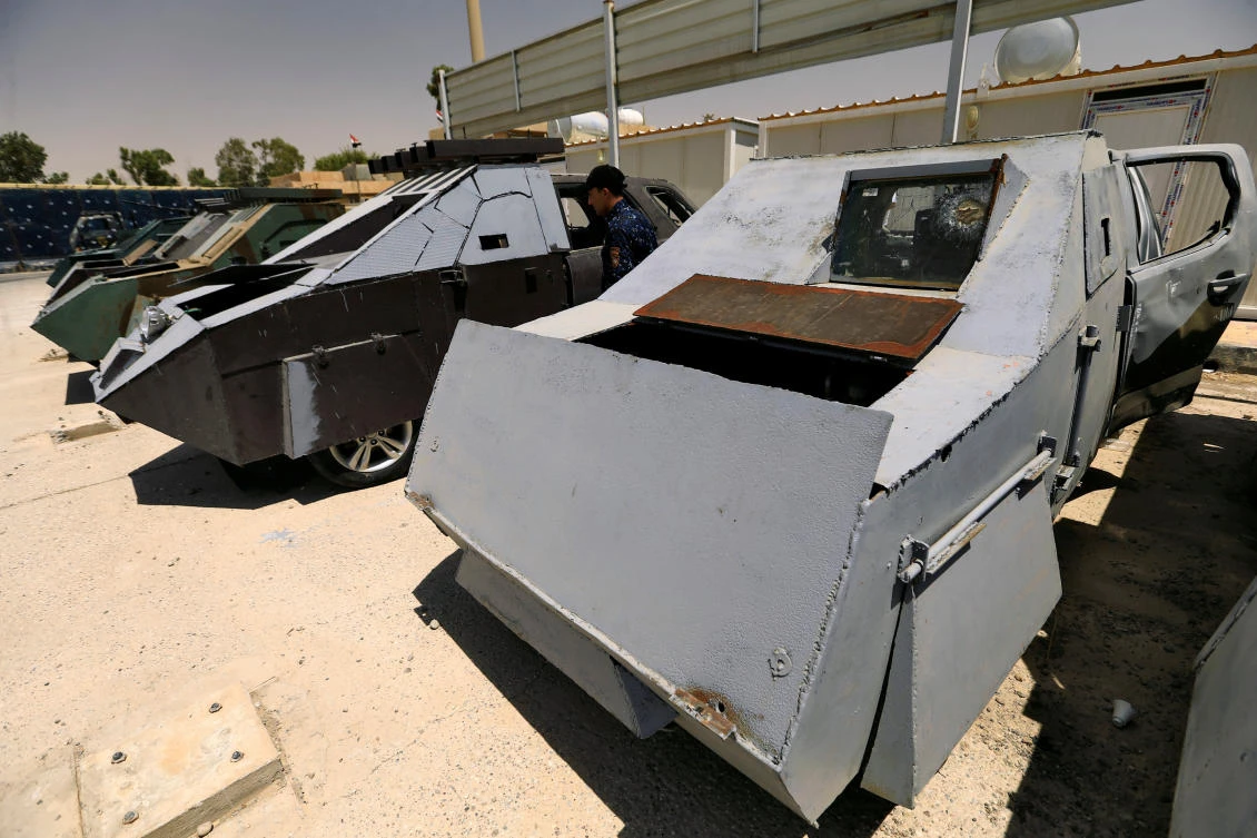 Iraqi police parade car bombs seized from Daesh