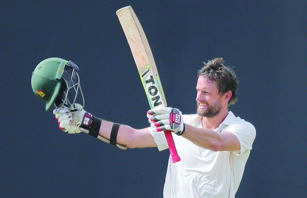 Zimbabwe’s Craig Ervine celebrates after scoring a century against Sri Lanka on Friday. (AP)