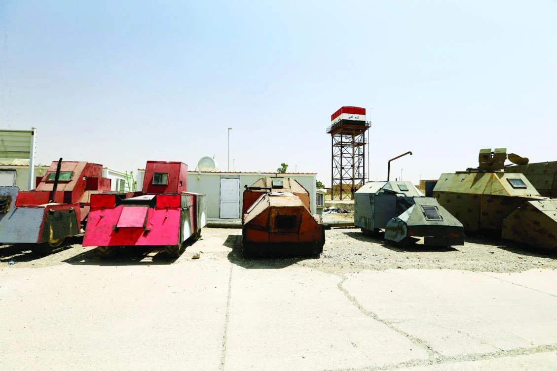 Vehicles used for suicide bombings by Daesh militants are seen after being confiscated in Mosul on Thursday. (Reuters)