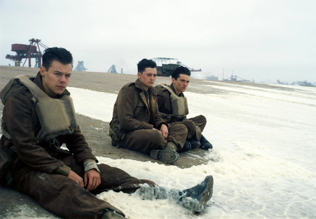 This image released by Warner Bros. Pictures shows Harry Styles, from left, Aneurin Barnard and Fionn Whitehead in a scene from "Dunkirk." Styles, 23, who gained fame with One Direction and recently launched his solo career, plays a British soldier in Christopher Nolan’s suspense-thriller about the evacuation of hundreds of thousands of Allied soldiers from Dunkirk, France, in May and June of 1940. (AP)