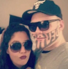 Would you employ a man with a face tattoo like this?