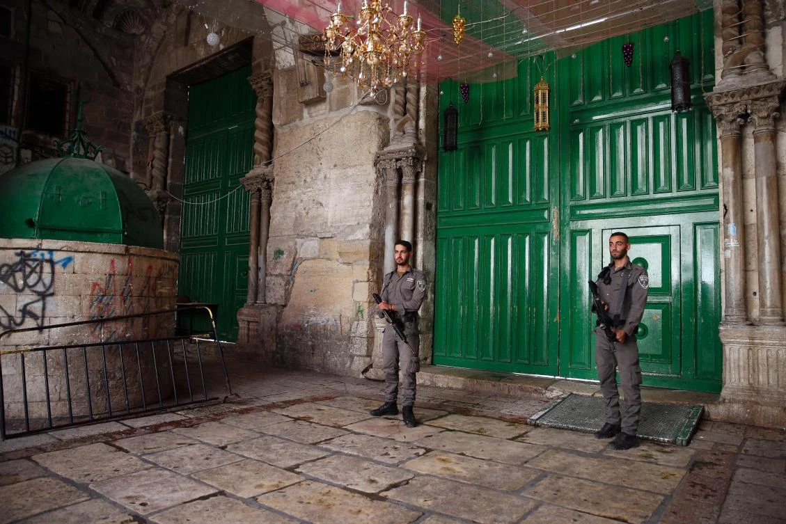 Israeli borderguards stand guard at one of the entrances to Al Aqsa mosque compound. (AFP)