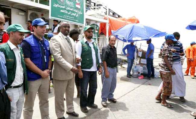 KSRelief staff bid farewell to trapped Somalis as they leave for their country. (SPA)