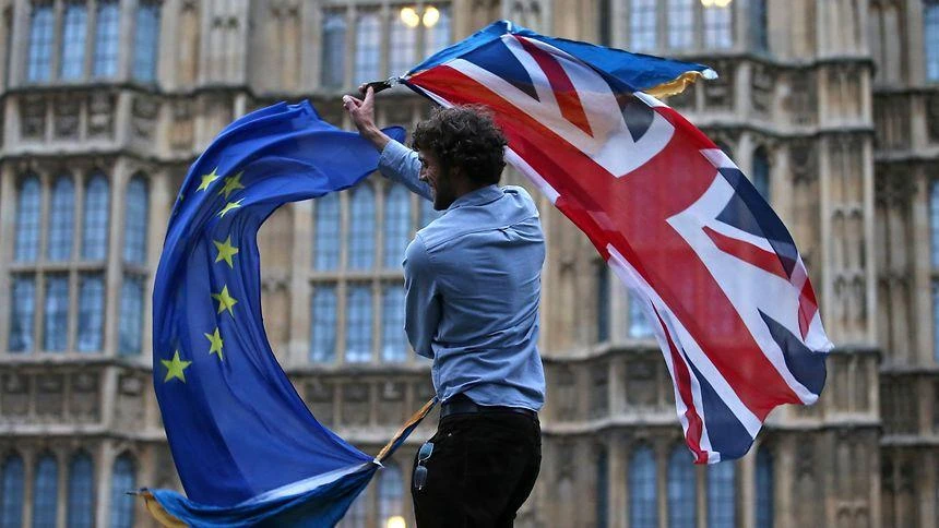 A man with the EU and UK flags. (AFP)