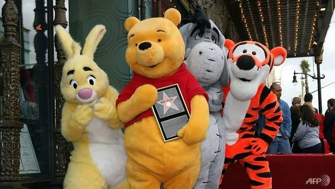 Rabbit, Winnie The Pooh, Eeyore and Tigger pose for photos as Winnie The Pooh receives a star on the Hollywood Walk of Fame in Los Angeles. (AFP)