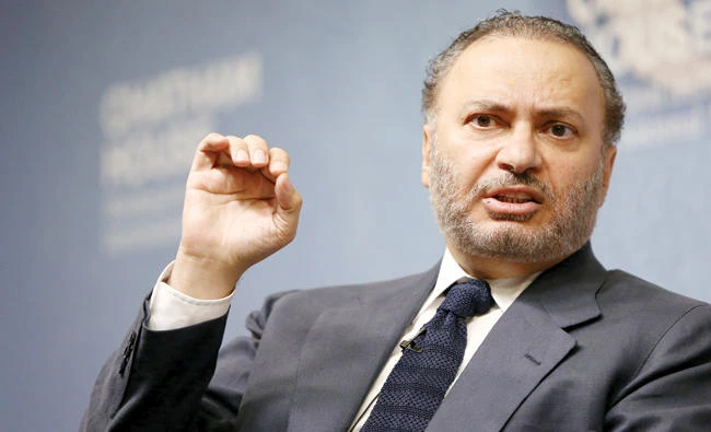 Anwar bin Mohammed Gargash, the UAE’s minister of state for foreign affairs, speaks at an event at Chatham House in London Monday. (Reuters)