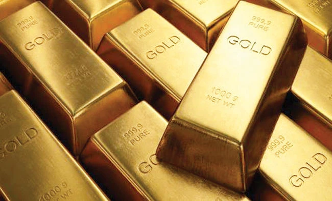 Gold up, poised for more gains on soft US rate outlook