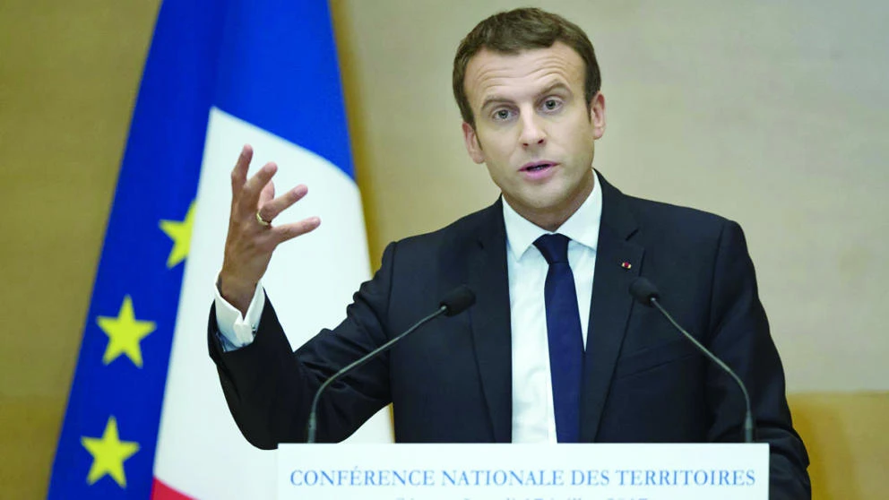 French President Emmanuel Macron delivers a speech during the National Conference of Territories at the Senate in Paris on Monday. (AFP)