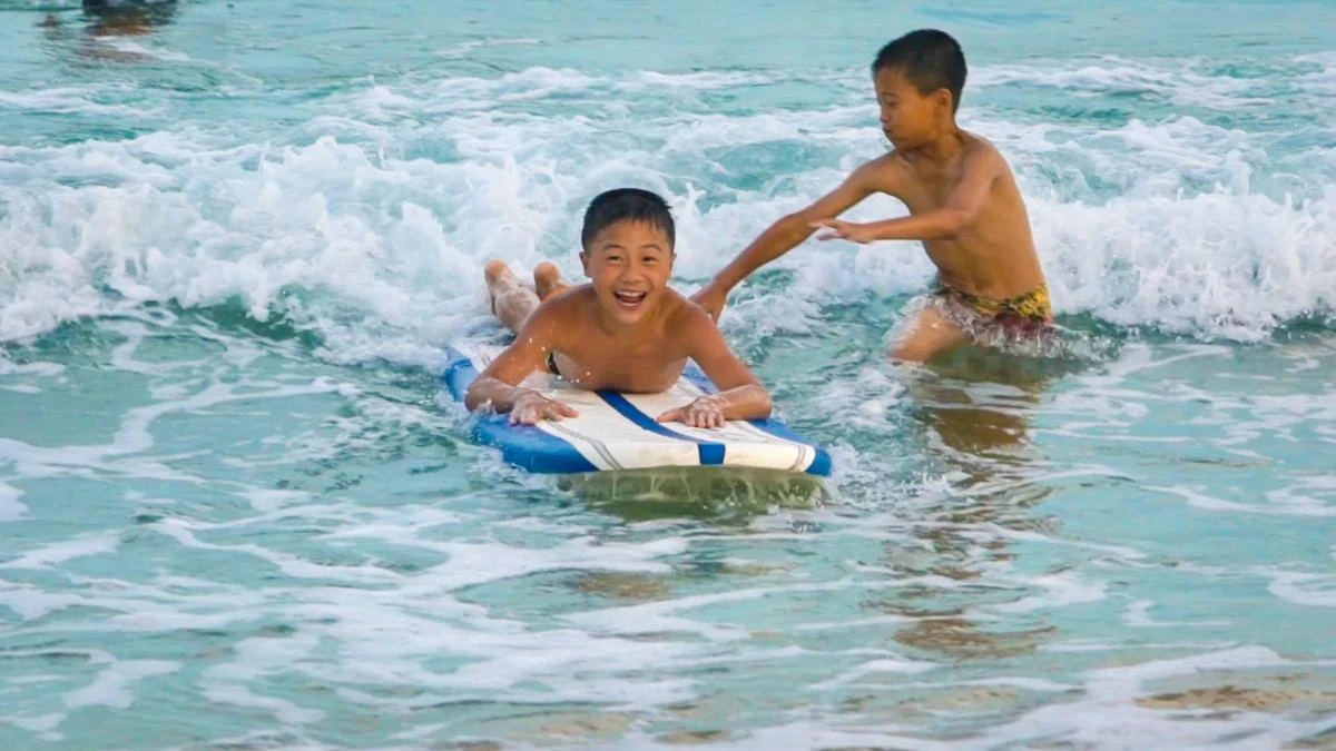 North Korean children 1st time surfing. (Photo courtesy: video grab)