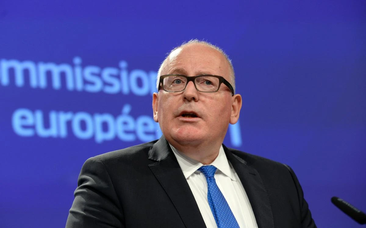 First Vice-President of the European Union Commission Frans Timmermans talks to the media about the situation in Poland at the European Union Commission headquarter in Brussels on Wednesday. (AFP)