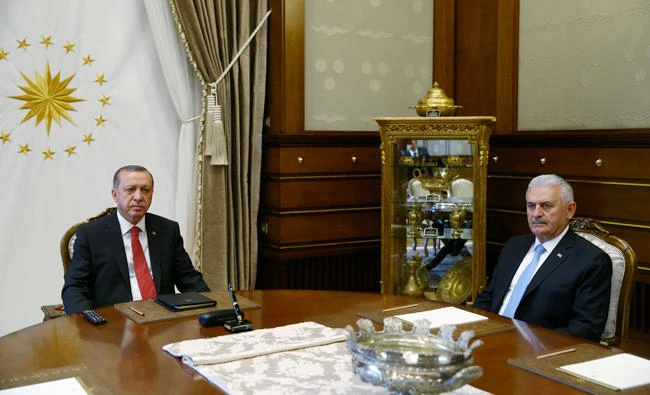 Turkish President Tayyip Erdogan meets with Prime Minister Binali Yildirim in Ankara on Wednesday. (Reuters)