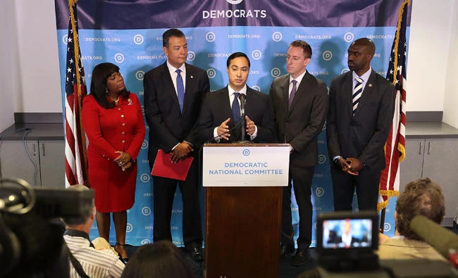 Rep. Joaquin Castro, (D-TX), speaks as (L-R) Rep. Terri Sewell (D-AL), California Secretary of State Alex Padilla, Jason Kander, president of Let America Vote, and DNC Vice Chair Michael Blake listen as they attend a press conference held at the Democratic National Headquarters on Wednesday in Washington, DC. (Joe Raedle/Getty Images/AFP)