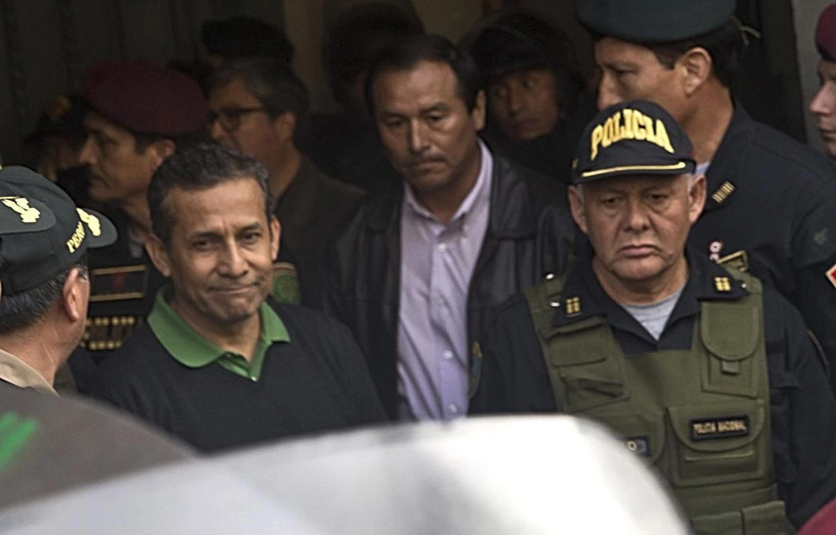Peru's former President Ollanta Humala, left, is escorted out of the Palace of Justice on July 14, 2017 to the Diones prison where ex-President Alberto Fujimori is serving time in Lima, Peru. (AP Photo/Martin Mejia)