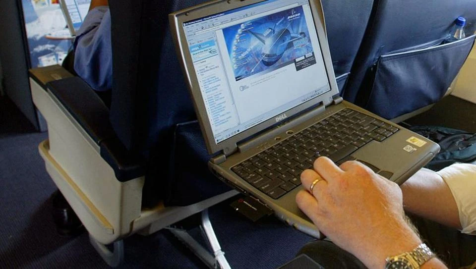 This is a July 29, 2002 file photo of a laptop being used on a plane . Britain's government Tuesday March 21, 2017 banned electronic devices in the carry-on bags of passengers travelling to the UK from six countries, following closely on a similar ban imposed by the United States.(AP)