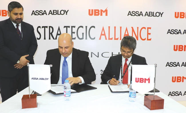 UBM and ASSA ABLOY officials at the signing ceremony.