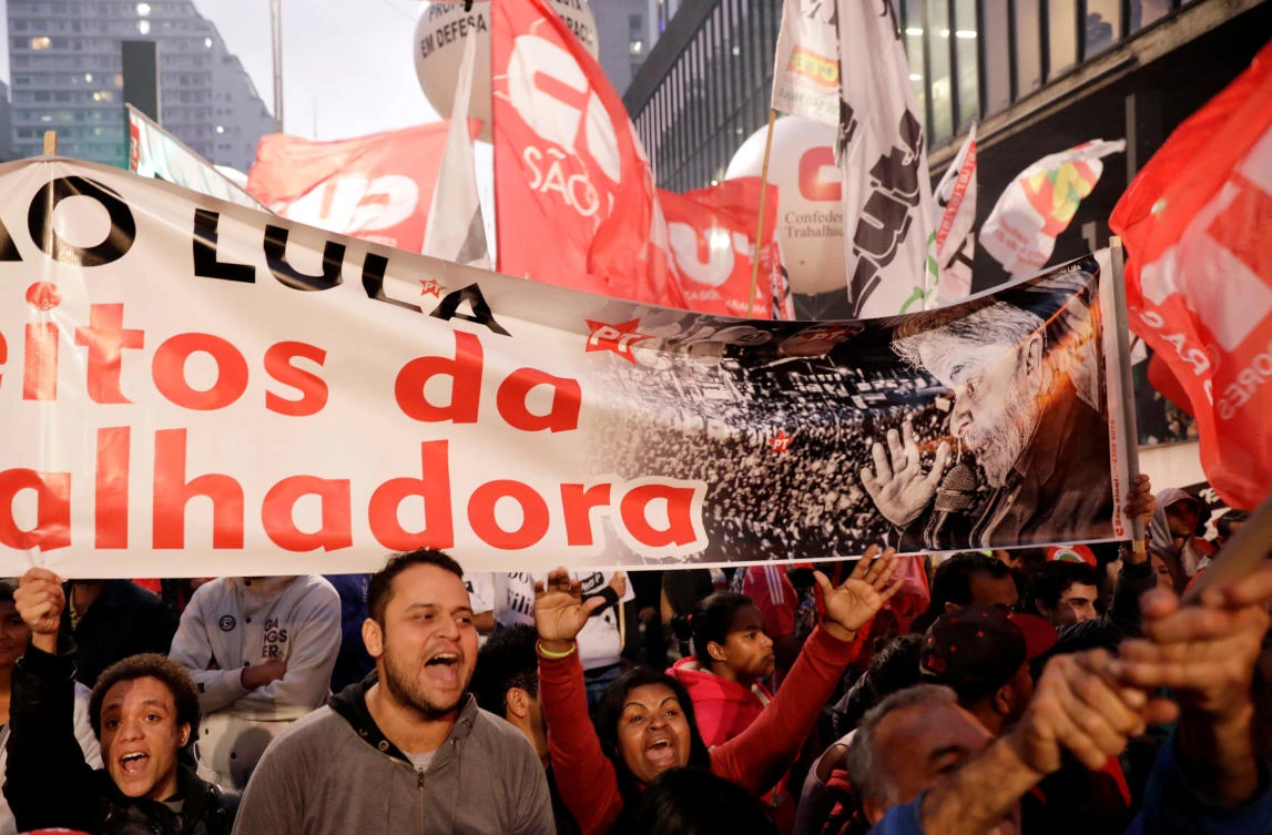 People attend a protest in Sao Paulo, Brazil, against the conviction on corruption charges of former president Luiz Inacio Lula da Silva on Thursday. (REUTERS/Paulo Whitaker)
