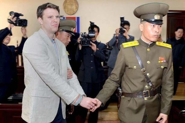 U.S. student Otto Warmbier is led away from North Korea's top court, in Pyongyang on March 16, 2016. (REUTERS)