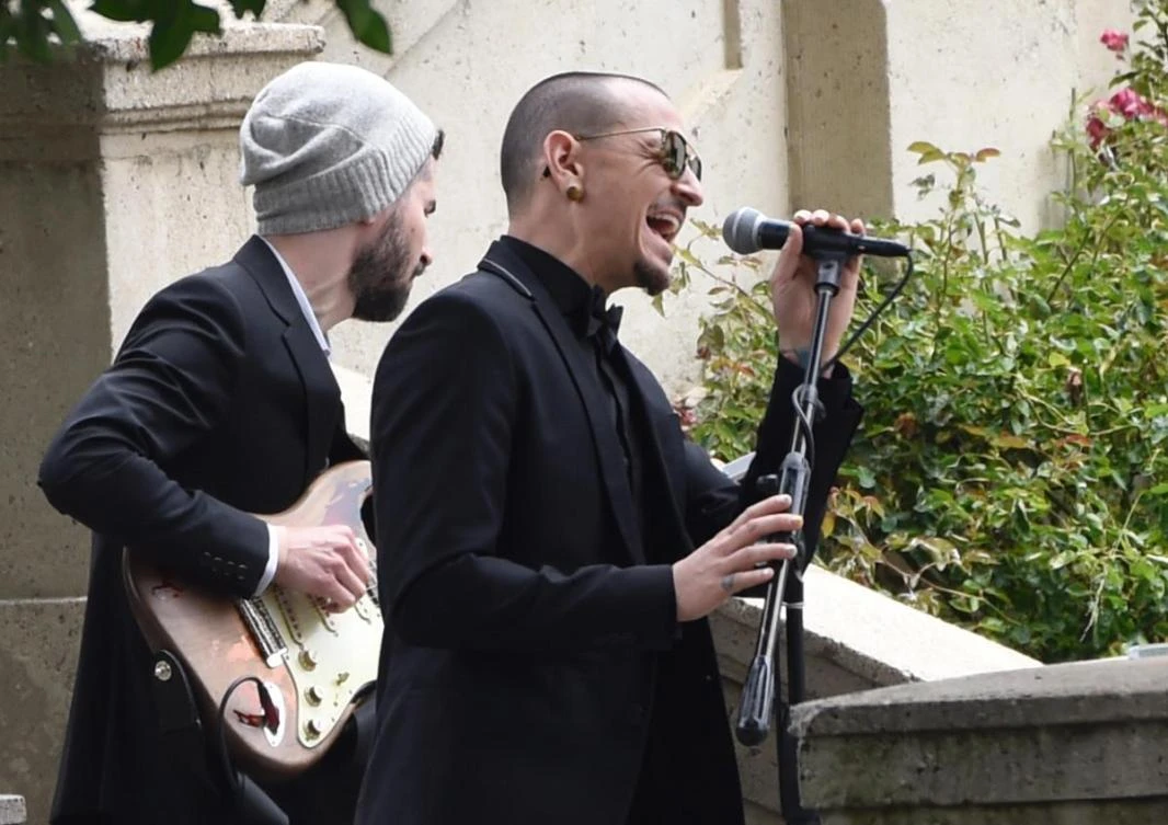 FILE - In this May 26, 2017 file photo, Chester Bennington, of Linkin Park, performs "Hallelujah" at a funeral for Chris Cornell at the Hollywood Forever Cemetery in Los Angeles. The Los Angeles County coroner says Bennington, who sold millions of albums with a unique mix of rock, hip-hop and rap, has died in his home near Los Angeles. He was 41. Coroner spokesman Brian Elias says they are investigating Bennington’s death as an apparent suicide but no additional details are available. (AP)
