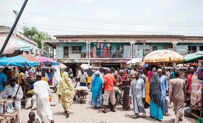 People walking among stalls at the Monday-Market, one of the biggest markets, in Maiduguri in northeastern Nigeria in this file photo. (AFP)