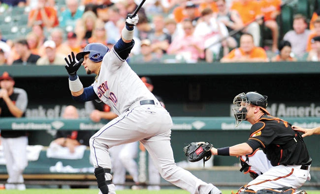 Houston Astros first baseman Yuli Gurriel hits a home run in the first inning against the Baltimore Orioles at Oriole Park at Camden Yards on Friday. (USA TODAY Sports)
