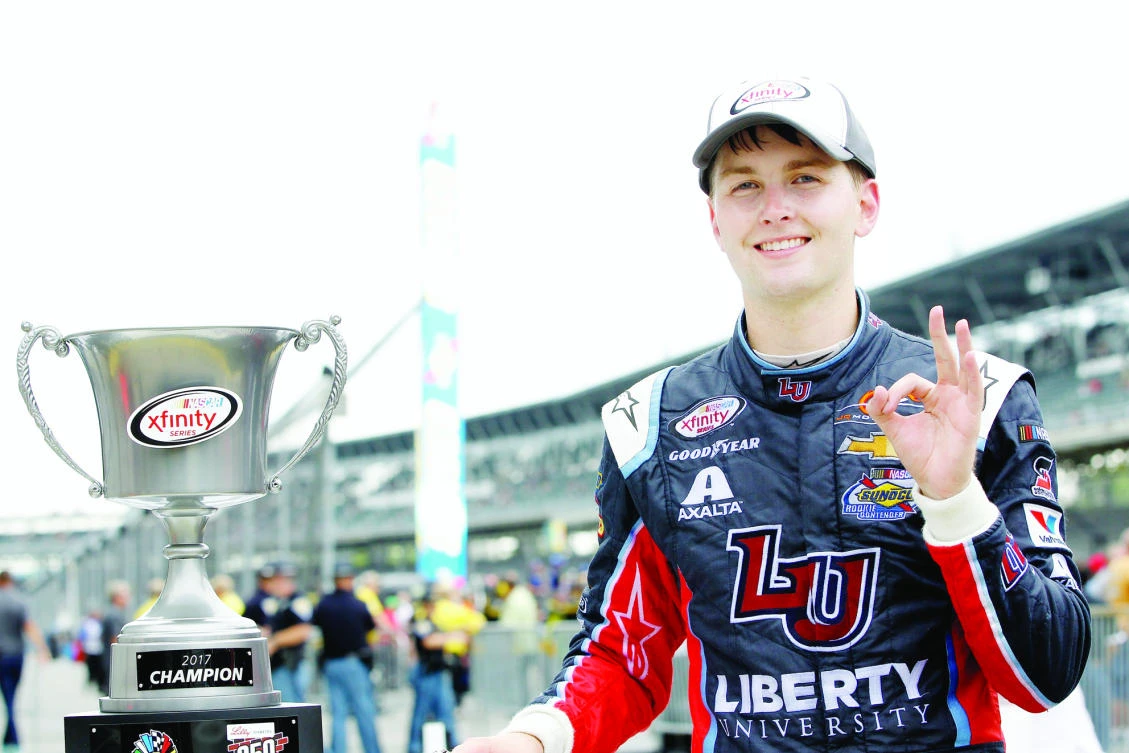 William Byron, driver of the #9 Liberty University Chevrolet, poses with the trophy after winning the NASCAR XFinity Series Lilly Diabetes 250 at Indianapolis Motorspeedway on Saturday in Indianapolis, Indiana. (AFP)